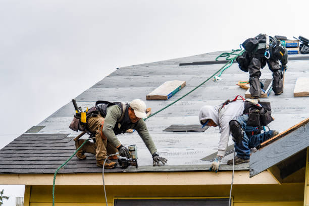 Professional Gutter Installation technician working in Islip, NY